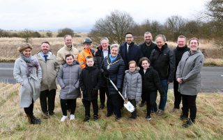Image shows attendees at groundbreaking celebration for North Ayrshire Council's first Solar PV Farm