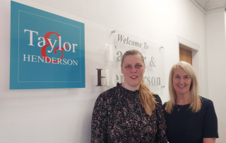 Photo of two employees at Taylor Henderson, North Ayrshire
