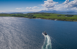 Ferry sailing towards isles of Cumbrae and Arran