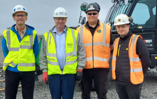 Four people on construction site