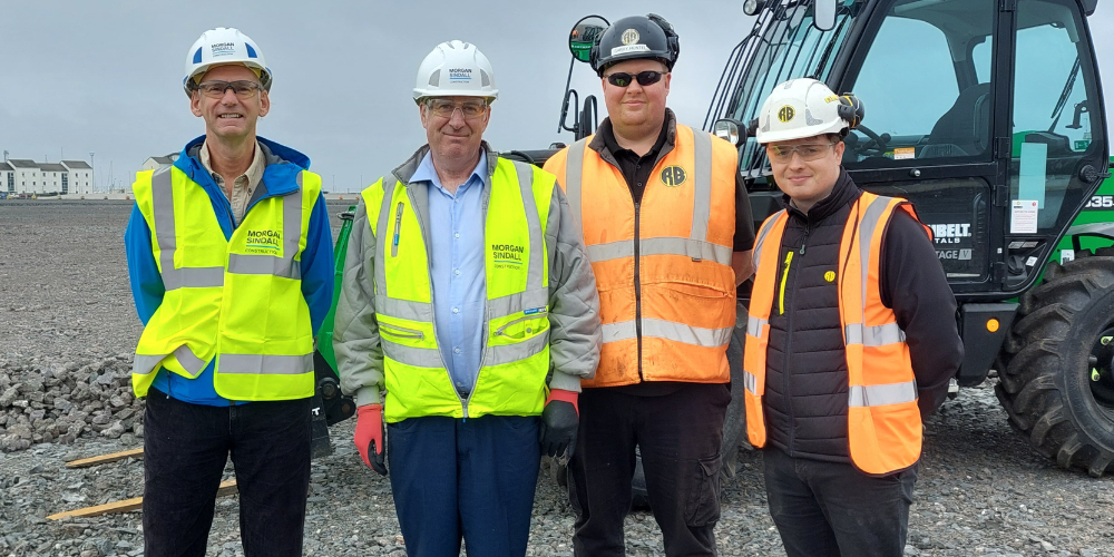 Four people on construction site