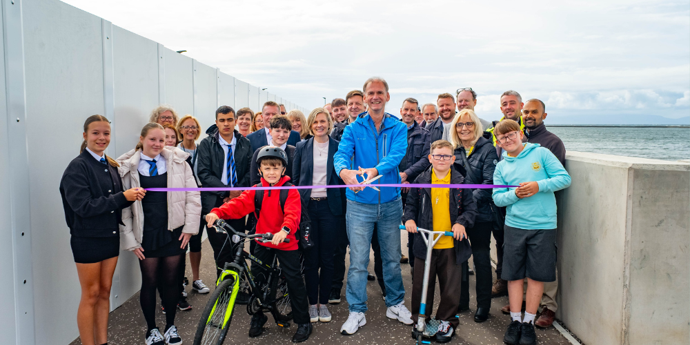 Group of people on caostal path
