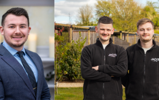 Three business owners smiling