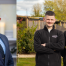 Three business owners smiling