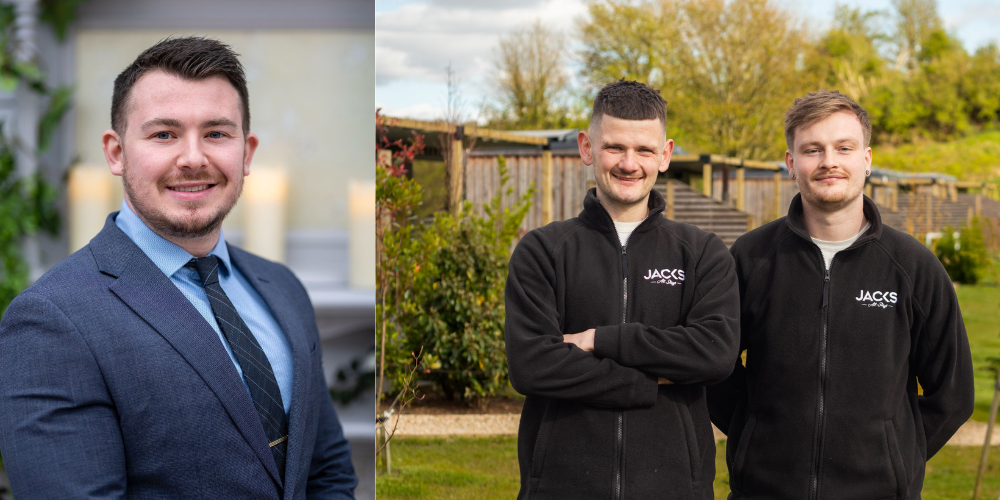 Three business owners smiling