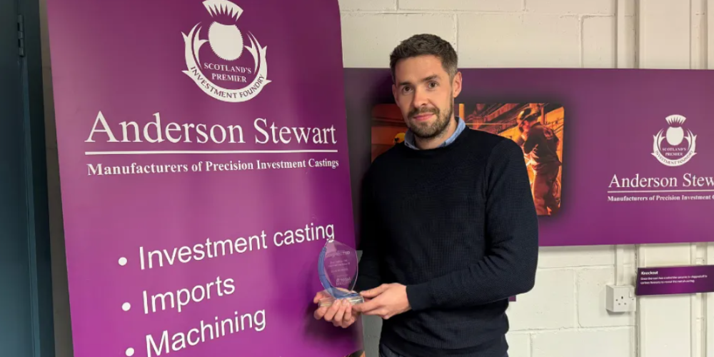 Person holding award