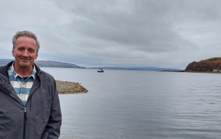 Man with island backdrop